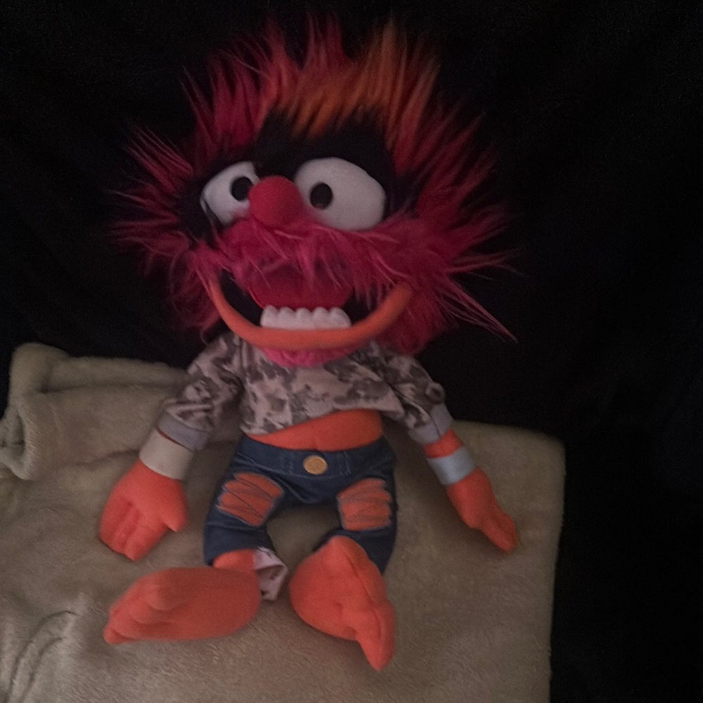 Plush Animal Toy with Orange and Pink Details
